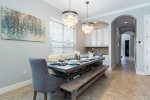 Gather around this formal dining table offering seating for 10.